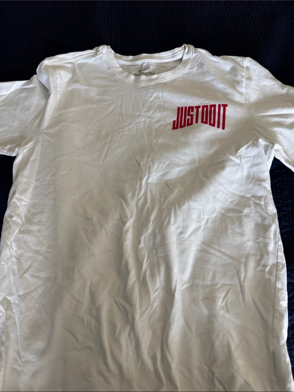 Nike White Short-Sleeve Tee with Red Swoosh and Chest Graphic